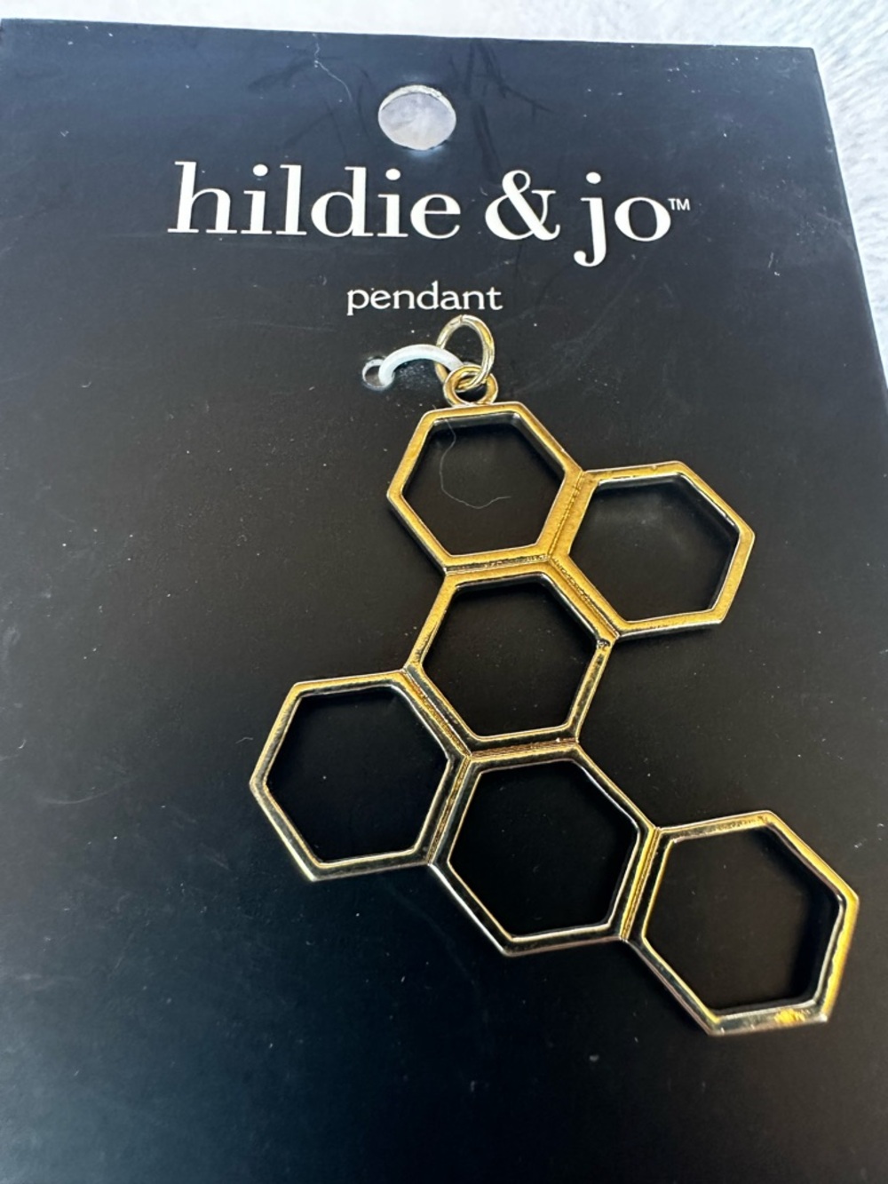 Honeycomb pendant in goldtone